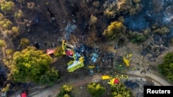 Spasilačke ekipe na mjestu pada aviona, ostrvo Evija, Grčka, 25. juli