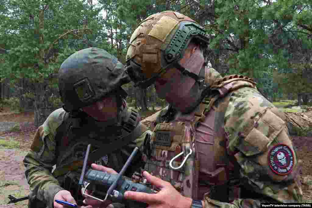 This image, of a fighter from Russia's Wagner mercenary group piloting a drone in the Brest region of western Belarus, is one of several released by Belarusian and Russian media on July 20. 