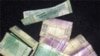 Kazakhstan, Tajikistan See Sharp Currency Devaluation