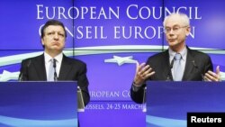 European Commission President Jose Manuel Barroso (left) and European Council President Herman Van Rompuy address a news conference at the end of an EU leaders summit in Brussels. 