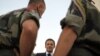 France Honors 10 Dead Troops, To Debate Afghan Role