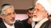مهدی کروبی (راست) و میرحسین موسوی.