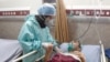 COVID-19: Russian Disease Specialist May Have Spread Virus; Georgia Declares State Of Emergency