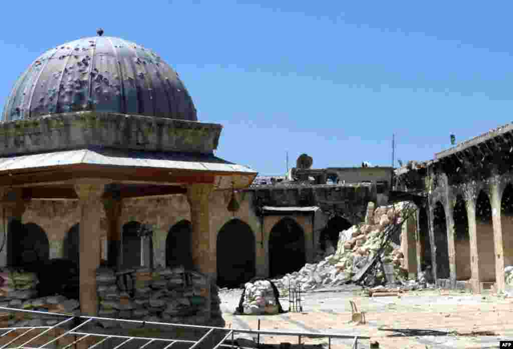 The rubble of the minaret of Aleppo's ancient Umayyad Mosque, located in the UNESCO-listed Old City of the northern Syrian city, after it was blown up on April 24, 2013. The iconic mosque in Aleppo's labyrinthine Old City has been a key battleground since July 2012, with rebels seeking the ouster of Bashar al-Assad's regime laying siege twice but each time managing only to keep control for less than 48 hours.