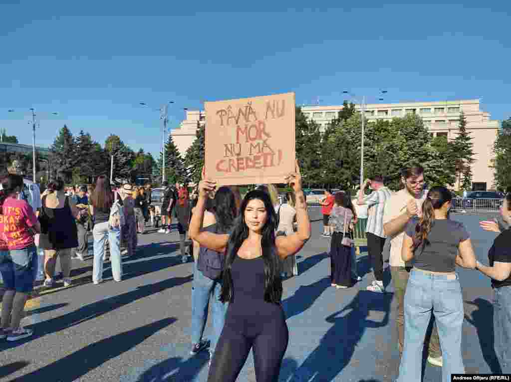 A woman holds a sign reading “You won't believe me until I’m dead,” during the Bucharest protest.Demands from protesters included increased protections for women and girls, recognition of femicide as a legally distinct crime, and mandatory training for police, judges, and others on the issue of gender-based violence.