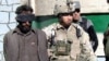 Afghan, Foreign Troops Retake Southwestern Town