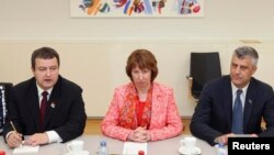 European Union foreign policy chief Catherine Ashton (center) poses with Serbian Prime Minister Ivica Dacic (left) and Kosovar Prime Minister Hashim Thaci at NATO headquarters in Brussels on April 19.