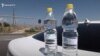 Armenia -- Homemade vodka sold on a roadside.