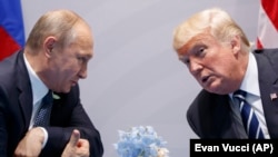 Президент США Дональд Трамп і президент Росії Володимиром Путіним, липень 2017 року