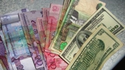 Diňle: Lebapda dollar satýanlara gözegçilik güýçlendi