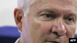 U.S. Secretary of Defense Robert M. Gates briefs the press on his way to Europe.
