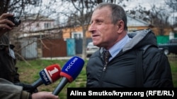 Mykola Semena speaks to journalists on March 20.