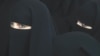 Pakistan -- Burqa-clad women in Islamabad, 09Jul2008