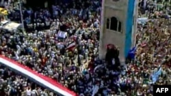 An image grab taken from YouTube footage shows hundreds of thousands of Syrian antigovernment protesters flooding the streets of the central city of Hama on July 1.