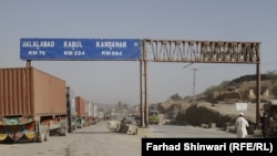 Trucks from Pakistan approach the Khyber Pass checkpoint on July 4 in anticipation of crossing the border into Afghanistan.