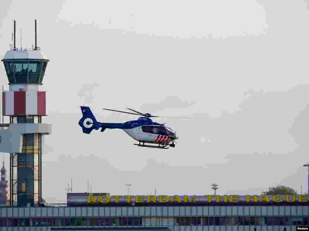 One of two helicopters believed to be carrying Mladic departs from Rotterdam airport in The Netherlands to deliver him to The Hague and the International Criminal Tribunal for the former Yugoslavia, an institution which has sought him for nearly 16 years on genocide and other alleged atrocities charges. REUTERS photo by Robin van Lonkhuijsen 