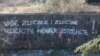 Grafit na partizanskom groblju u Mostaru, februar 2015. 